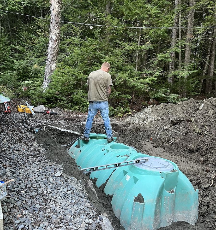 Homestead Heroes crew at work on septic installation