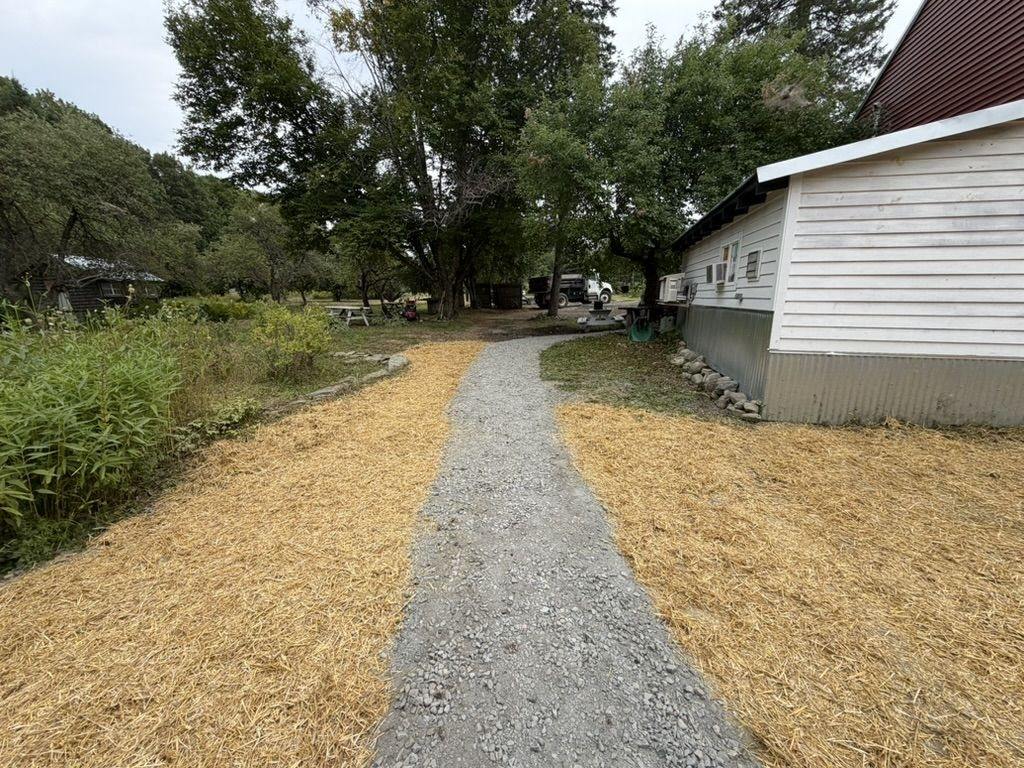 Finished gravel walkway between the buildings